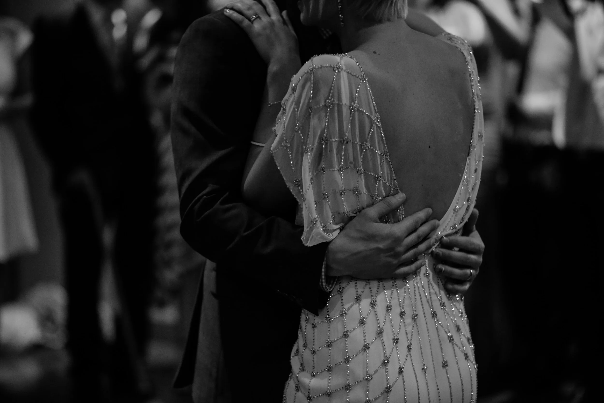 Couple close embrace black and white